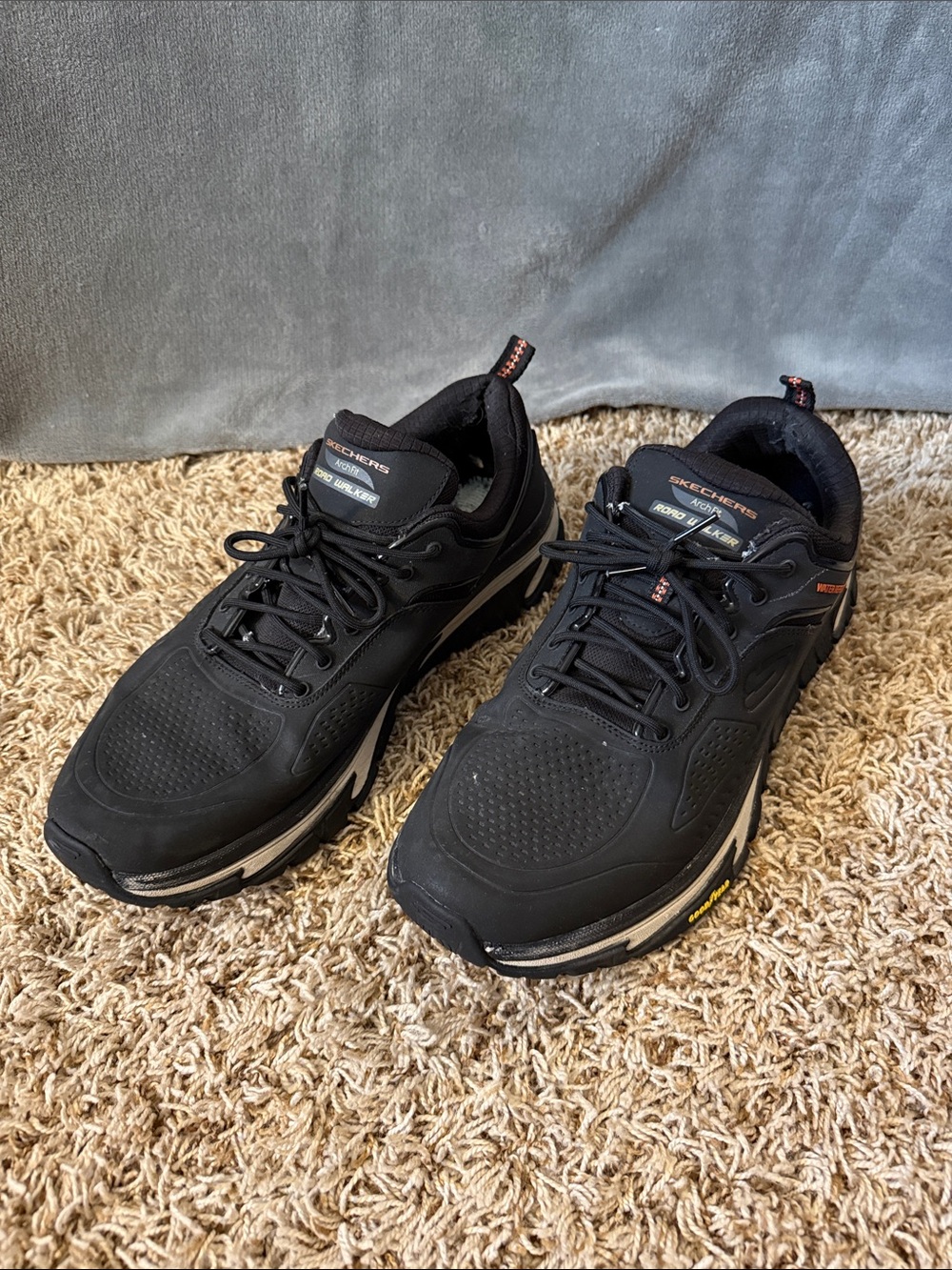Skechers Men’s Black Athletic Sneakers with Subtle Orange Accents